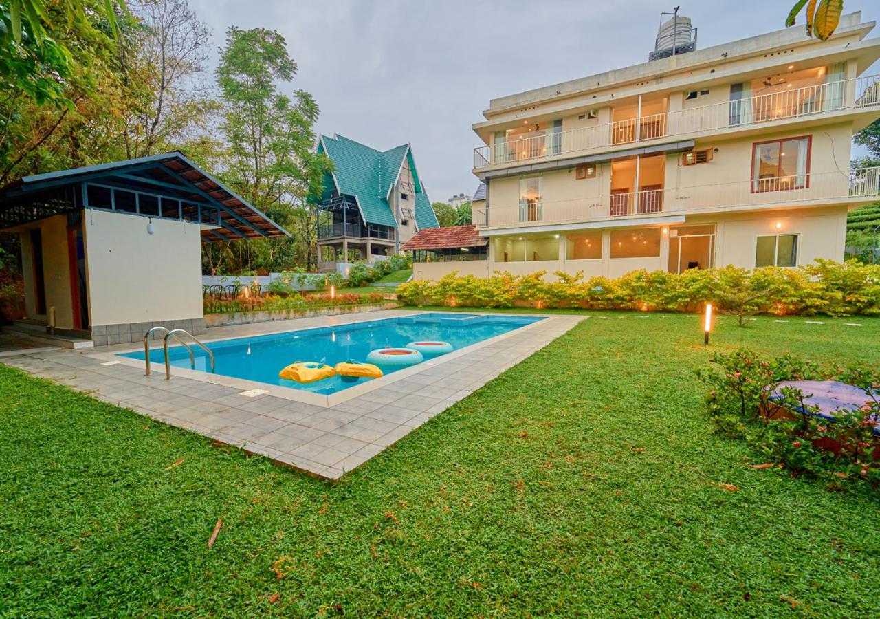 Glen Castle Vagamon Pool Resort By Voye Homes Eksteriør billede
